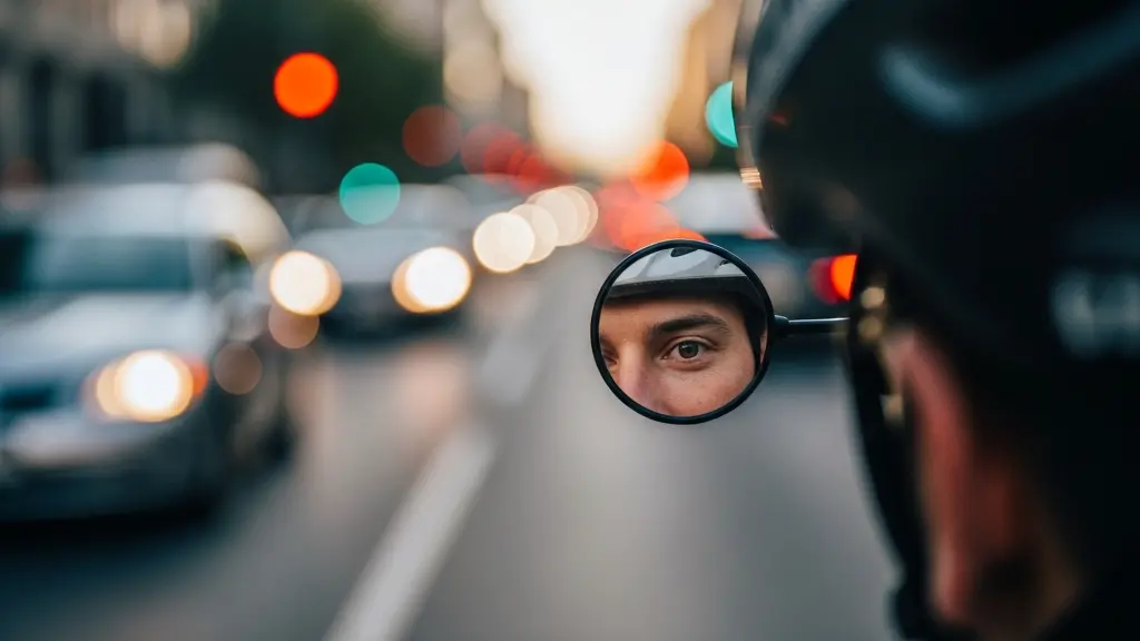 Close-up of a cyclist's eyes reflecting concentration while navigating urban traffic.